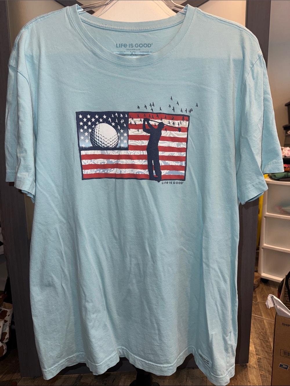 Life Is Good Light Blue Men’s Golf Flag Graphic Tee